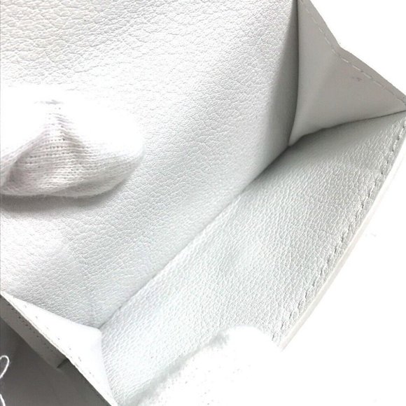 LOUIS VUITTON Portefeuille lock mini Compact Wallet Trifold Leather - Picture 4 of 14